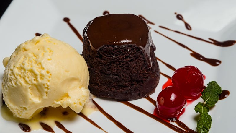 Warm chocolate lava cake with vanilla ice cream scoop