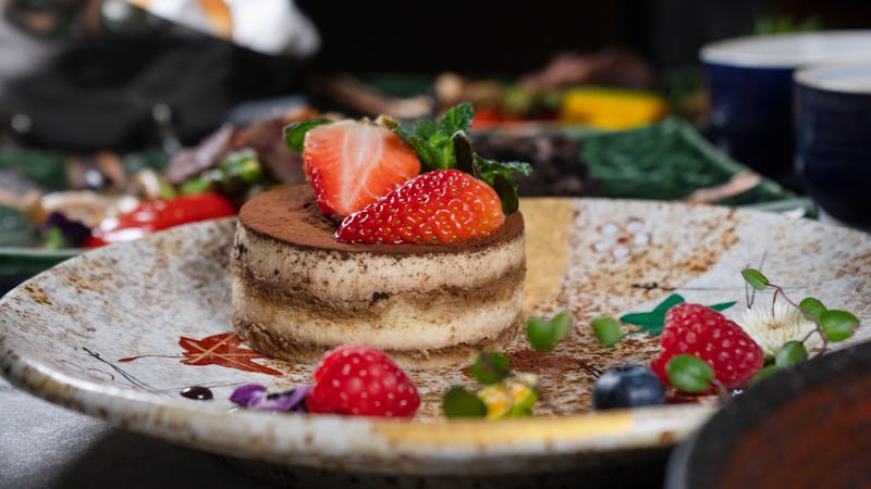 Nutella pizza dessert with strawberries and powdered sugar